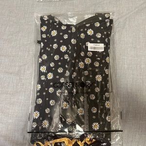 Corset Story corset. Black with Daisy flower print.